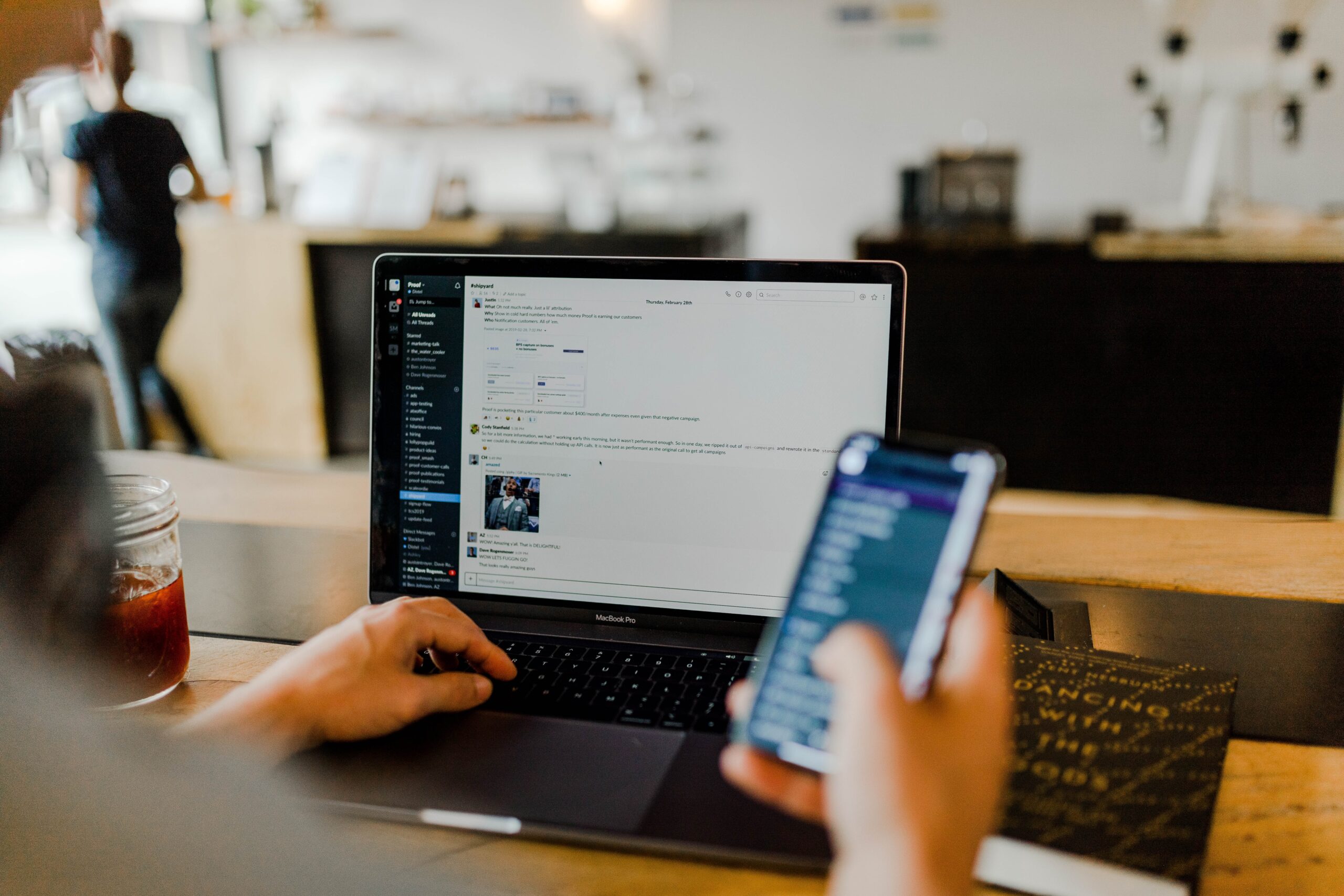 Photo of a phone and a laptop